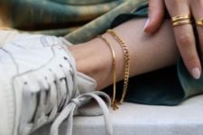 16 two chain anklets -a sleek and a chunky one done in gold will accentuate your look a lot