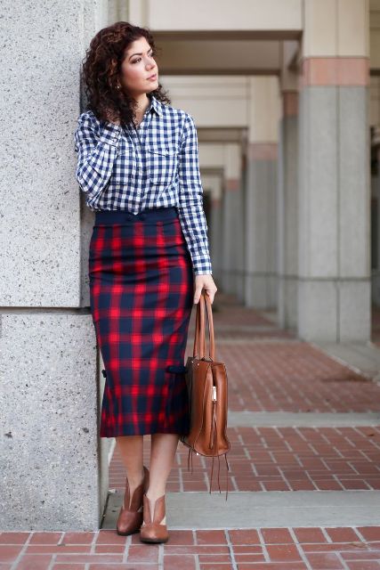 With checked button down shirt, brown leather bag and brown cutout shoes