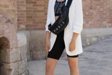 With crop top, white long blazer, bag and black sneakers