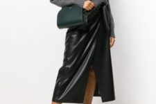 With gray loose sweater, white sneakers and black leather wrapped midi skirt