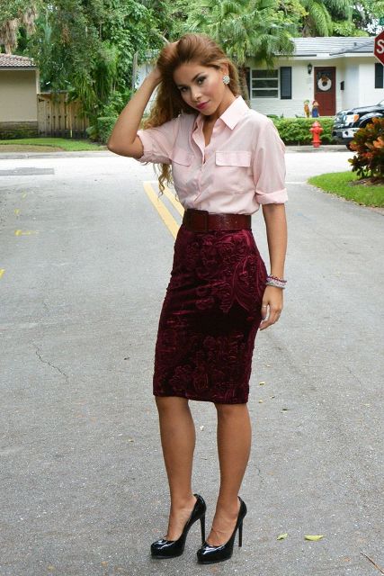 With pale pink button down shirt and black patent leather pumps