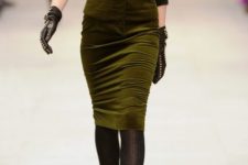 With printed sweater, black embellished gloves, black tights and brown lace up boots