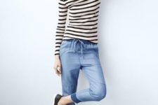 With striped shirt and black and white flat shoes