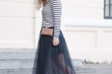 With striped shirt, mini bag and white sneakers