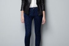 With white blouse, navy blue and black printed skinny pants and ankle strap shoes