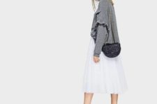 With white pleated midi skirt, black ankle strap shoes and gray loose sweater