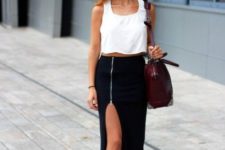 With white sleeveless top, marsala bag and black ankle boots