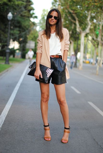 With white t-shirt, beige blazer, metallic clutch and two colored high heels