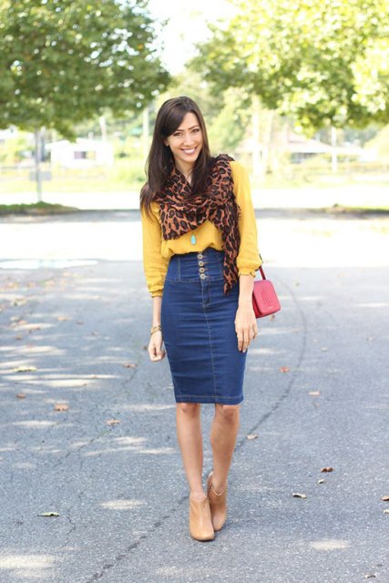 With yellow blouse, leopard scarf, red bag and beige ankle boots