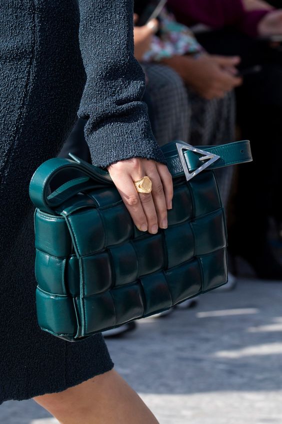 a gorgeous dark green woven leather bag will bring a touch of refined color and chic to your look