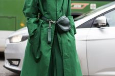 an apple green oversized midi trench, a matching dress, white booties and a dark green bag for a monochromatic look