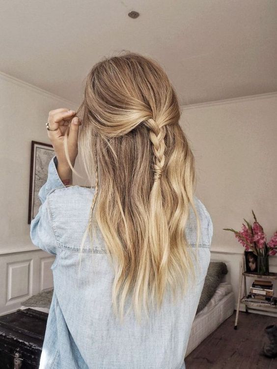 an easy half updo with a braid and some locks down is a cool idea for a casual look