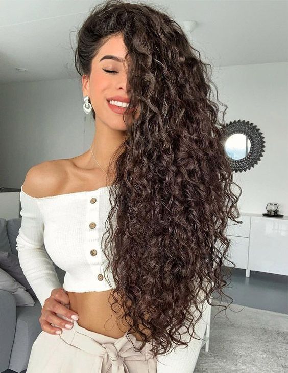 even if you don't have curls, you can always make them on your extra long hair for a trendy look