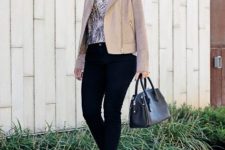 With beige jacket, black leather bag, black pants and heeled boots