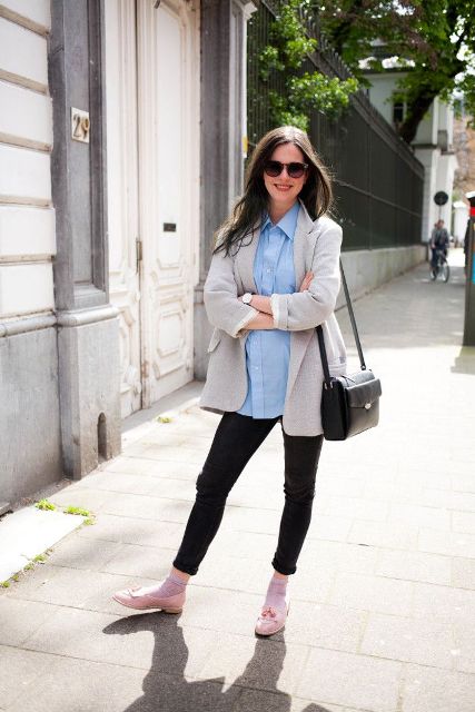 With light blue shirt, gray blazer, cropped pants, black bag and pink shoes