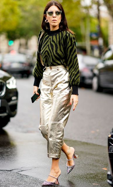With metallic pants, embellished mules and bag