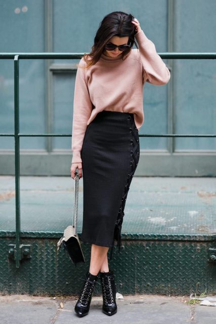 With pale pink sweater, chain strap bag and black ankle boots
