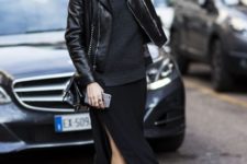 With sweater, black leather jacket, chain strap bag and patent leather boots