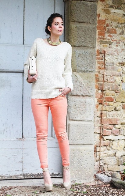 With white sweater, white clutch and beige platform shoes