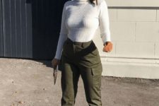 a girlish look with a white turtleneck, olive green cargo pants, sheer shoes for this spring