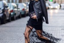a statement look with a black bodycon dress, a black sheer skirt with appliques, black boots, a leather jacket and a cap