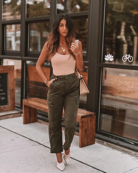 a summer look with a blush top, green cargo pants, white shoes and a blush bag to try