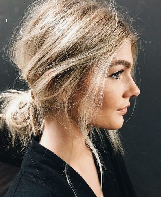 a super messy low updo with a messy top and face-framing hair is a lovely idea for every day