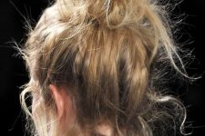a stylish top knot hairstyle