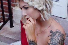 10 short wavy icy blonde hair with a single side braid for a bolder and boho touch to your look