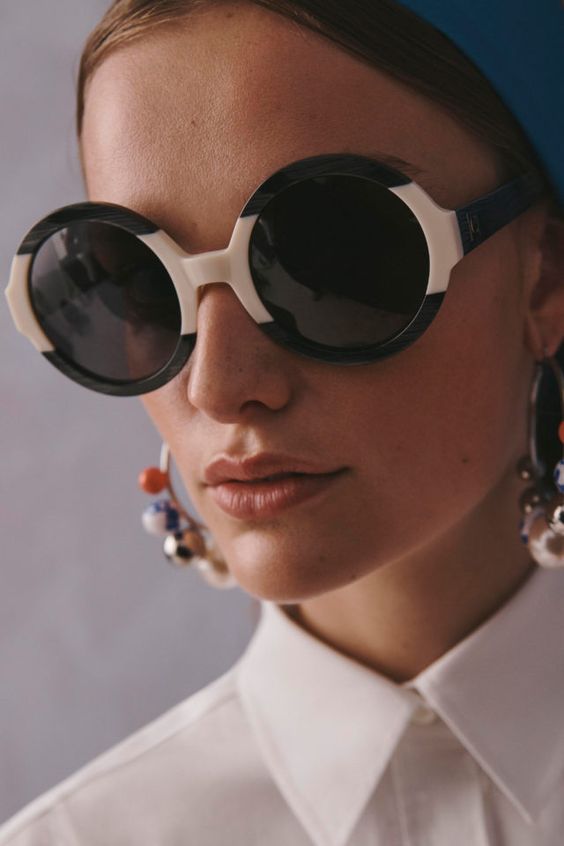 statement large and round sunglasses in black and white are an ultra modern and edgy accessory