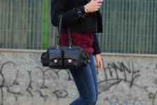 With black cropped jacket, marsala shirt, skinny jeans and black bag