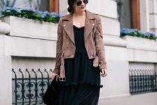 With black midi dress, suede jacket and black bag