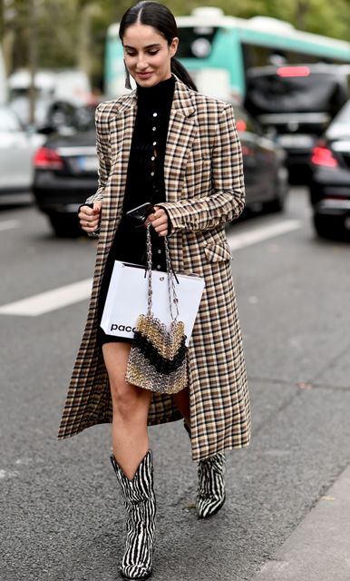 With black mini dress, checked coat and unique bag
