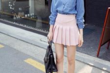 With denim shirt, black leather bag and black flat shoes