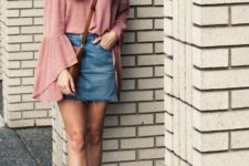 With denim skirt, brown bag and white sneakers