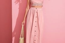 With hat, tote bag, pale pink maxi skirt and lace up sandals