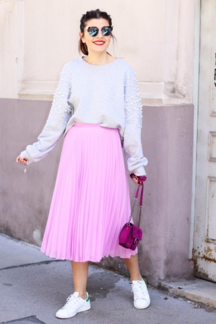With light gray embellished sweatshirt, purple bag and white sneakers