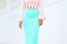 With midi skirt, golden belt and beige pumps