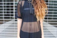 With transparent pants and black crop top