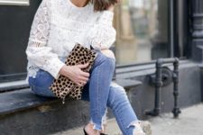 With white lace blouse, leopard printed clutch and distressed skinny jeans