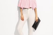 With white skinny pants, black clutch and ankle strap shoes