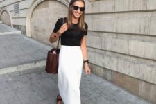 a black top, a white midi skirt, black sandals and a brown bag for a chic minimalist look