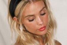 a black velvet padded headband as a fashion statement and a comfy accessory for any hair