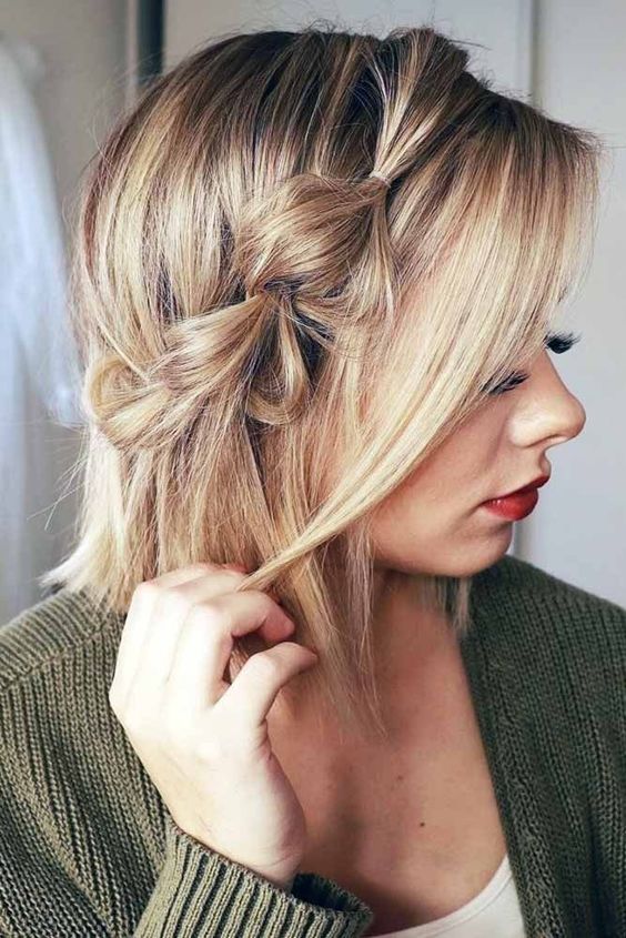 a blonde bob with a bubble side braid and some locks framing the face is a lovely party hairstyle idea
