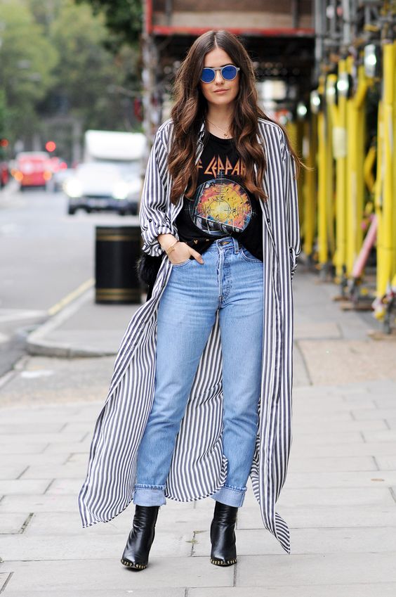 a bold printed tee, blue jeans, black booties and a striped shirtdress for a bold and rock-inspired look