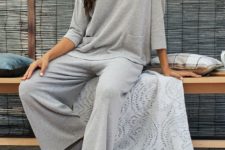 a casual grey loungewear suit with an oversized top with pockets and wideleg pants looks cool