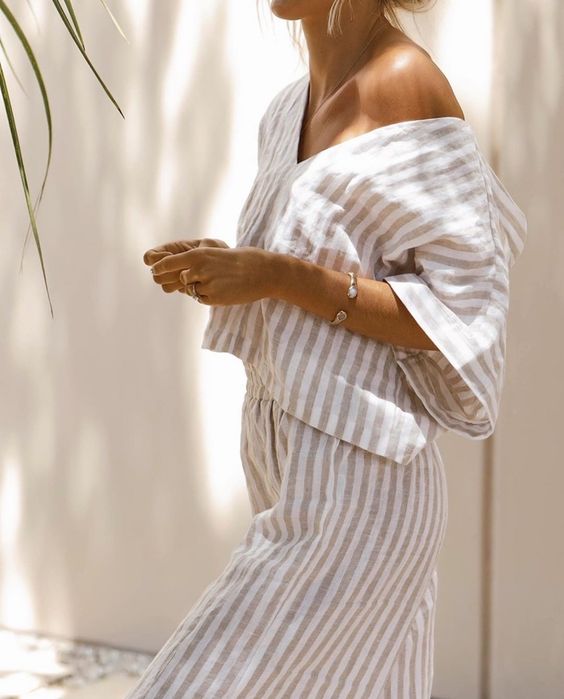 a comfy striped linen loungewear suit with an oversized V-neckline top and wideleg pants