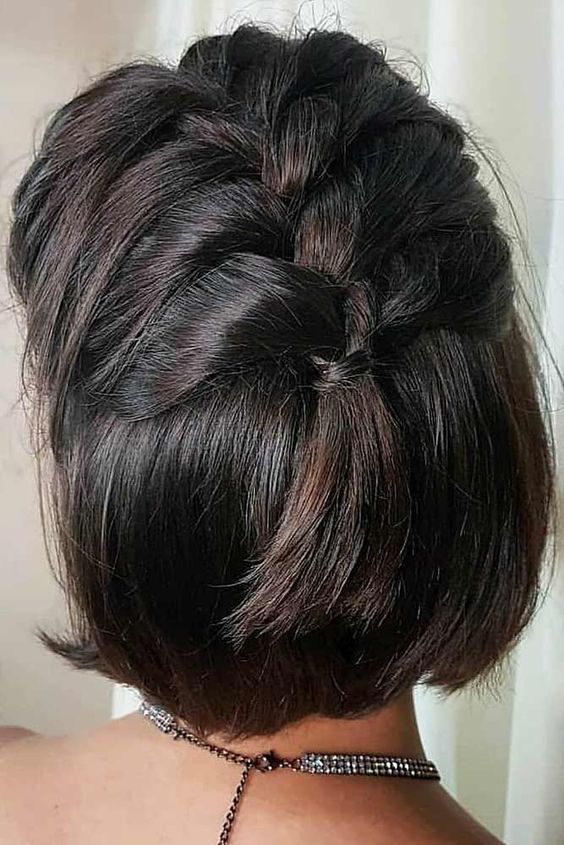 a half updo with a braid on top is a pretty idea if you have a midi or long bob