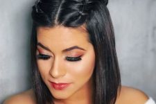 a lovely long black bob with straight hair and two braids on top is a cool and catchy idea for the holidays