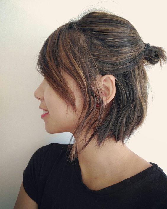 a midi bob with a bump on top and a small bun plus some face-framing hair is amazing